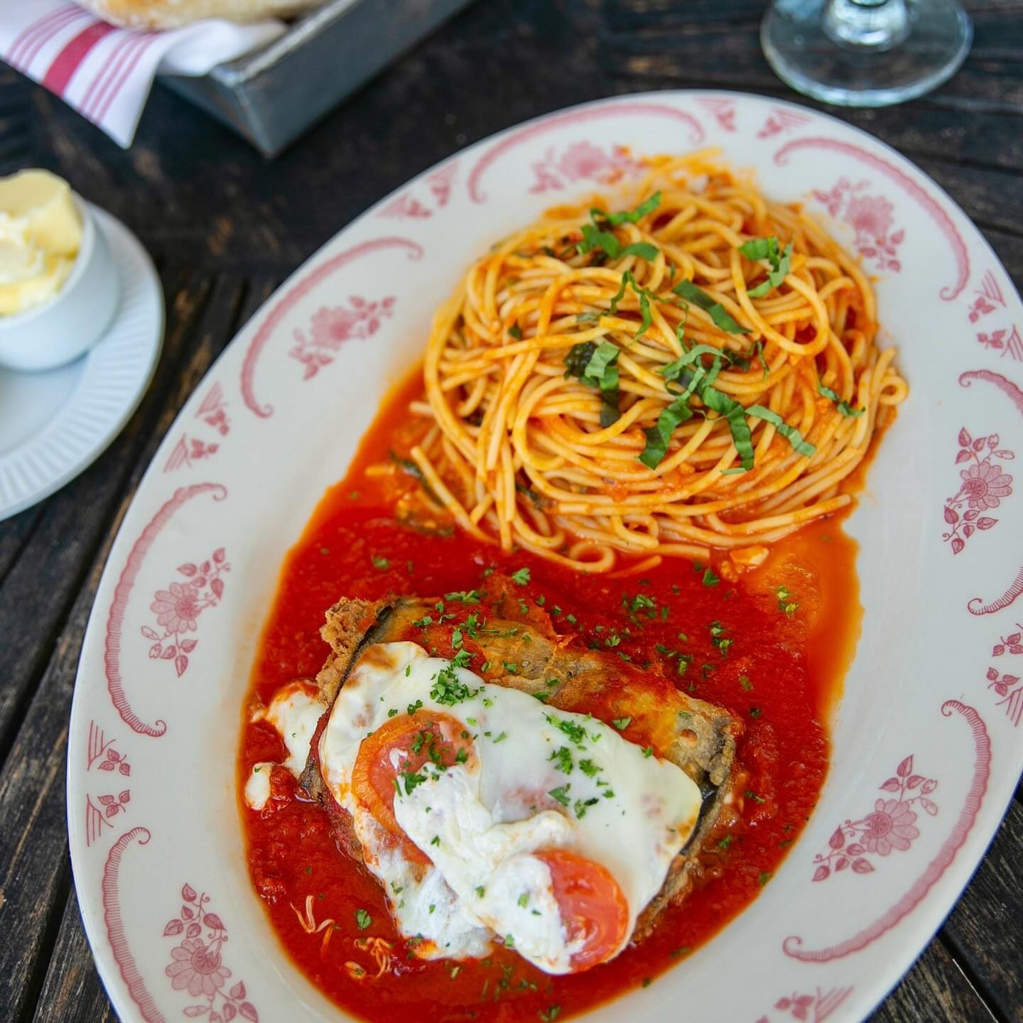 Parmigiana with spaghetti pomodoro